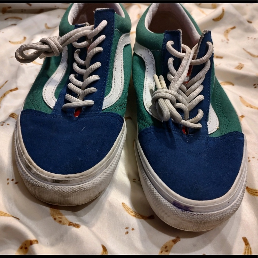 Blue and green low top vans